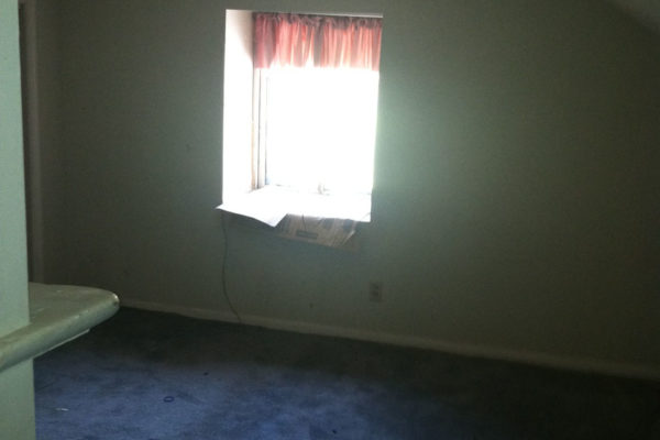 Pre-demo: Blue carpet in the upstairs bedroom