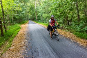 A biker on the resurfaced towpath.