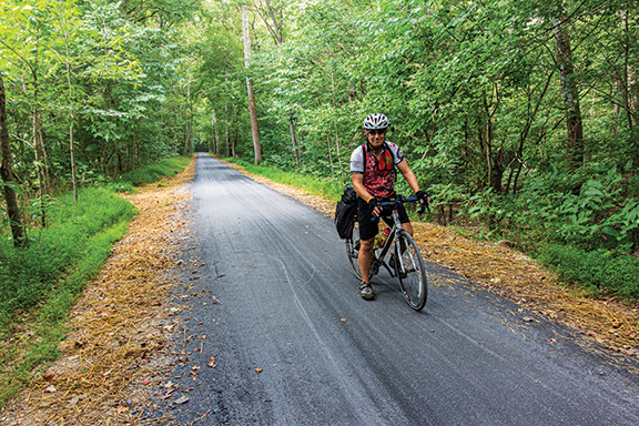 A biker enjoys the resurfaced towpath.