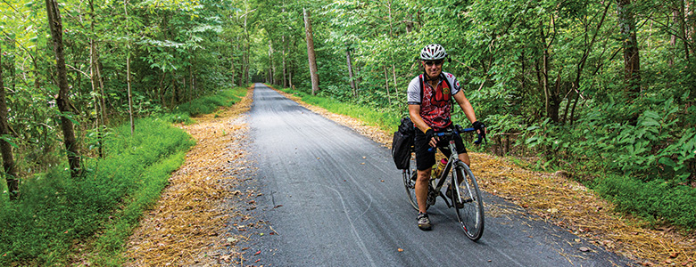 A biker enjoys the resurfaced towpath.