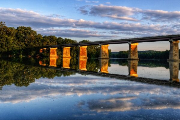 Sunrise of the Route 11 bridge that crosses over the C&O Canal and the Potomac River in Williamsport, Maryland by Nicholas Clements