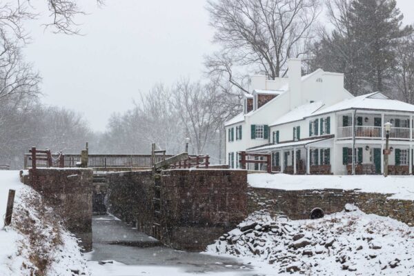 Great Falls Tavern During Heavy Snowfall by Roy Sewall