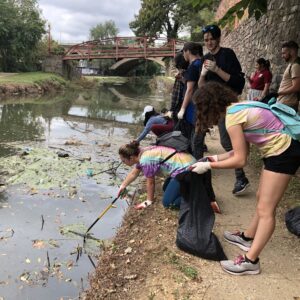Canal For All participants help clean canal.